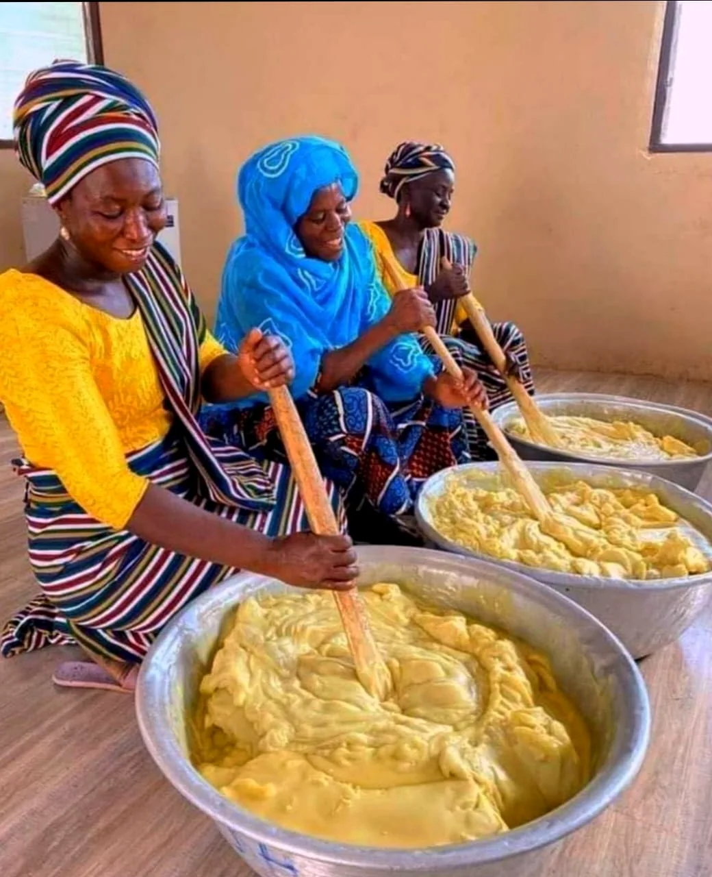 Women working together during traditional natural-product preparation